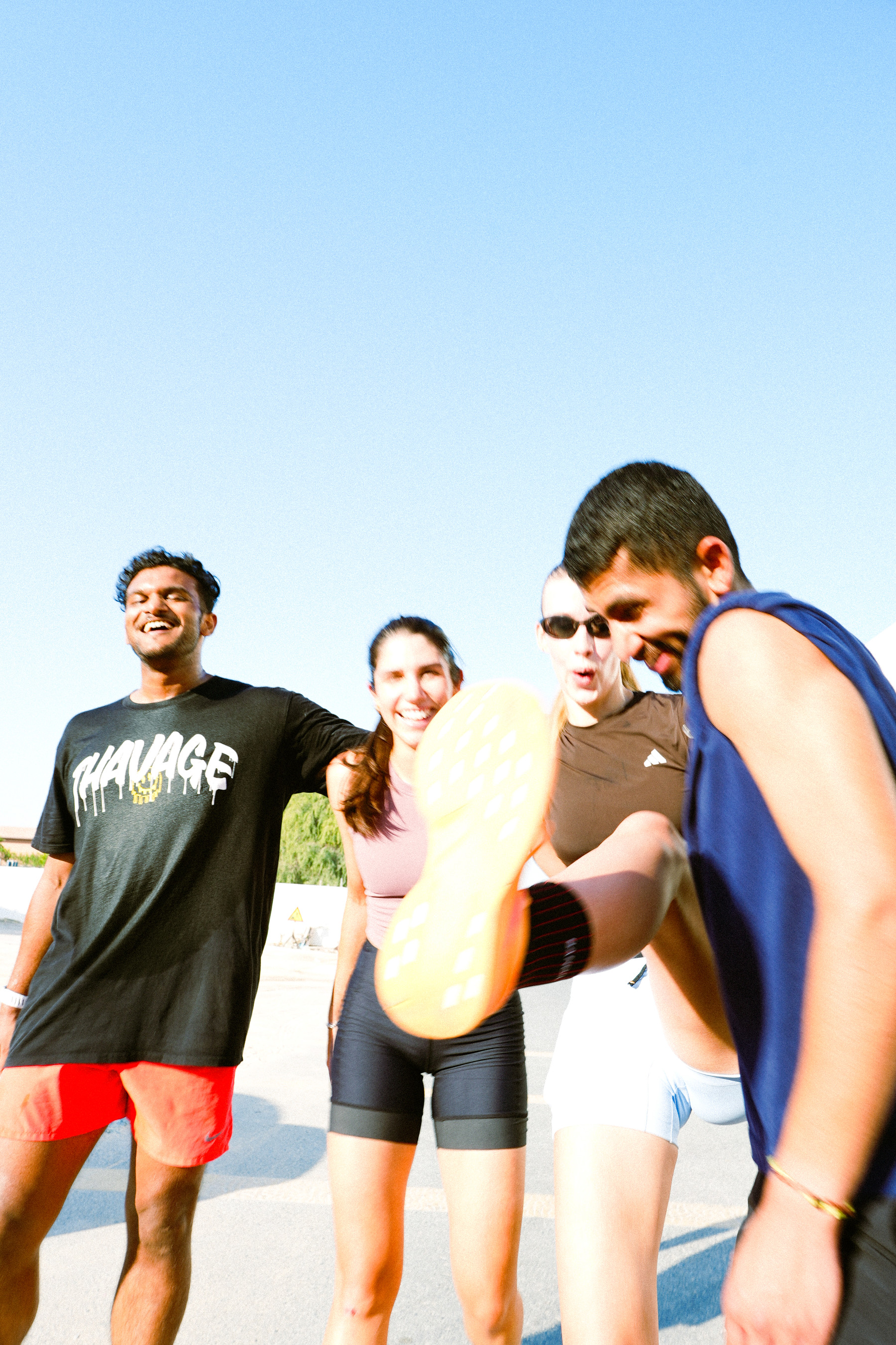Runners laughing together at a RunKwa run club