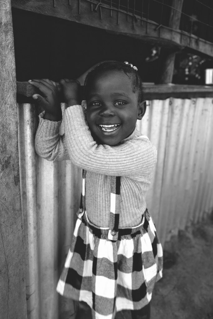 A young girl smiling in Kenya